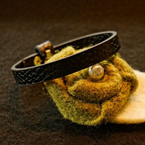 Kunstlederarmband schwarz Verschlußknopf